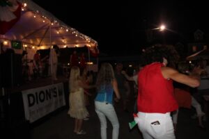 spectators dancing in front of stage